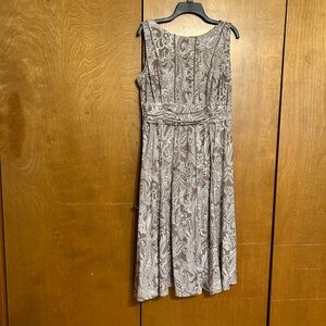 Like new! Wore only once. Sleeveless dress size L